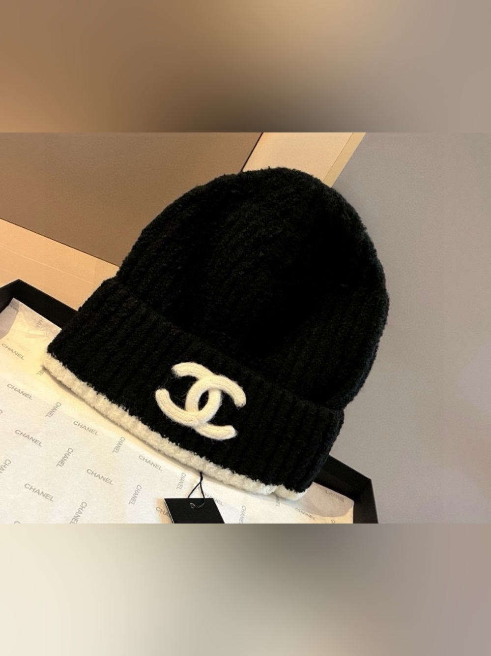 CHANEL Black Ribbed Beanie with White CC Emblem